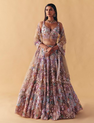 Beige net lehenga with pearls and sequins spark