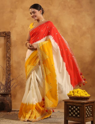 Golden radiance tissue silk saree with royal embellishments