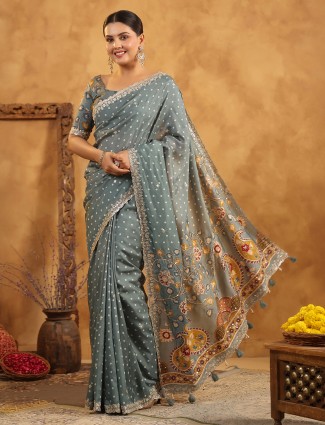 Grey silk saree featuring traditional resham work