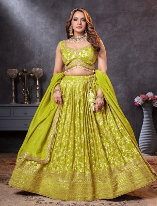 Mehendi green tissue silk lehenga choli with sleeveless cut