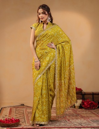 Mustard yellow silk saree with vibrant printed appeal