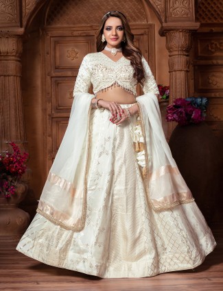 Off white tissue silk lehenga choli in classic design