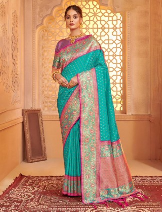 Aqua silk saree designed for graceful festive wear