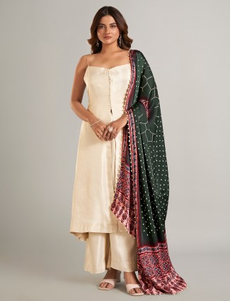Beige silk festive palazzo suit with printed dupatta