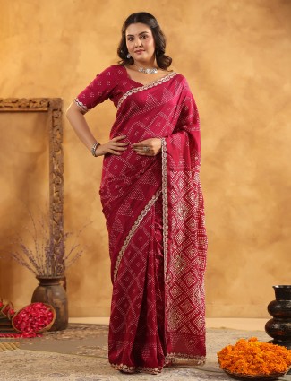 Maroon silk saree with aabla and gota ornamentation