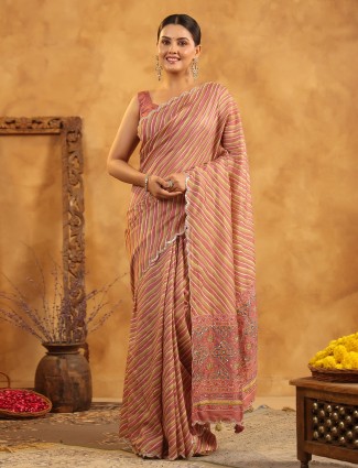 Olive and pink silk saree with festive printed flair