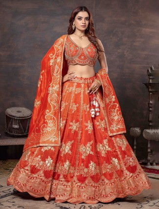 Orange sleeveless tissue silk lehenga choli with dupatta