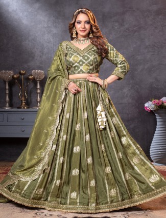 Pastel green tissue silk lehenga choli with quarter sleeves