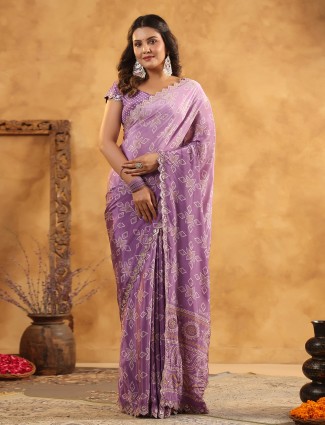 Purple printed silk saree suited for festive gatherings