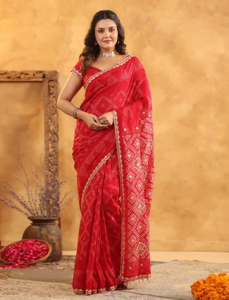 Red silk saree designed for festive appeal