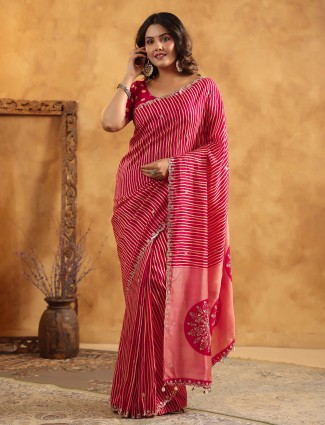 Red silk saree embellished with resham and cutdana work
