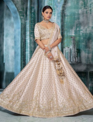 Beige raw silk bridal lehenga choli with bead work