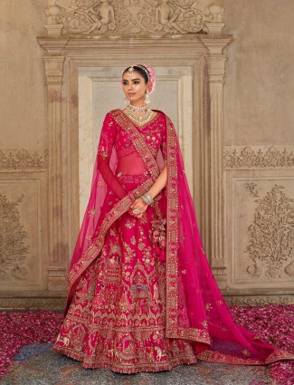 Magenta silk bridal lehenga choli with rich resham and sequins work