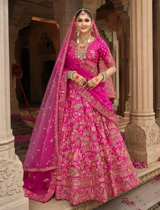 Pink silk bridal lehenga with intricate thread artistry