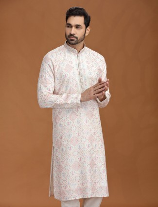 White viscose kurta suit with colorful motifs
