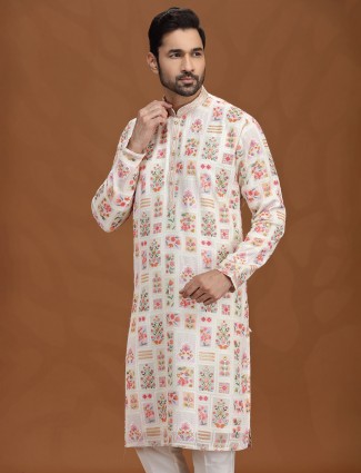 Cream georgette kurta suit with colorful motifs