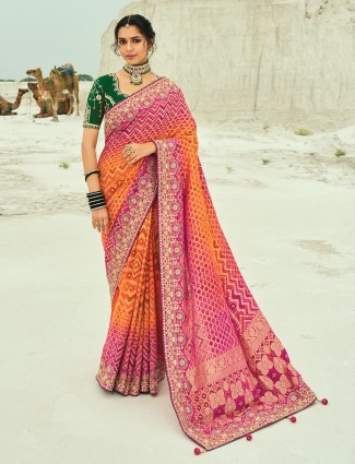 Shaded orange and rani color bandhej georgette saree
