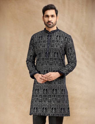 Black velvet kurta suit enhanced with resham work