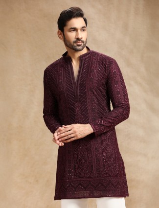 Wine georgette kurta suit accented with embroidery