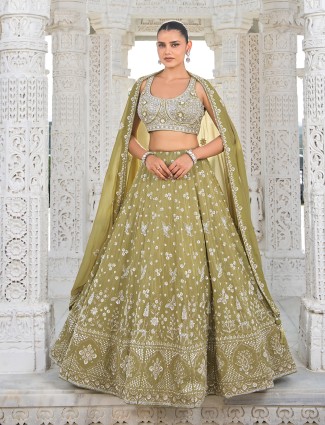 Olive silk mehendi ceremony lehenga choli