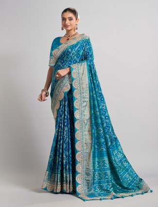 Blue patola silk saree with embellished detailing