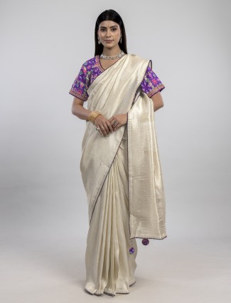 Golden radiance tissue silk saree with royal embellishments
