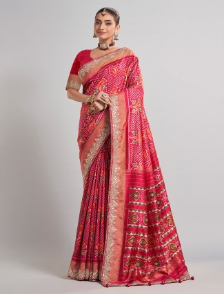 Rani pink patola silk saree with bridal work