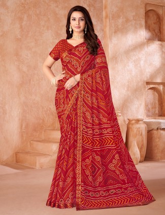 Red bandhani printed chiffon saree for festive wear