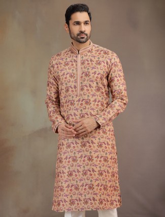 Peach silk kurta suit with printed motifs