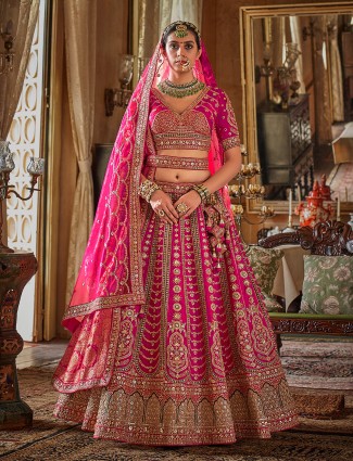 Magenta silk bridal lehenga with sequins embellishment