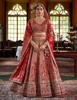 Red silk bridal lehenga with heavy embellishment