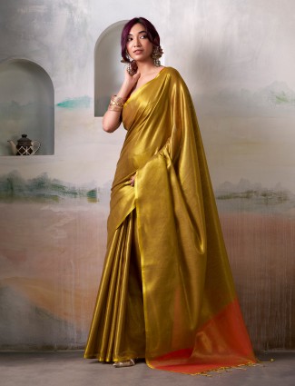 Golden radiance tissue silk saree with royal embellishments