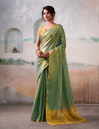 Golden radiance tissue silk saree with royal embellishments