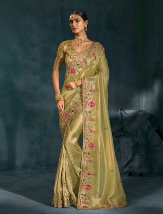 Golden radiance tissue silk saree with royal embellishments