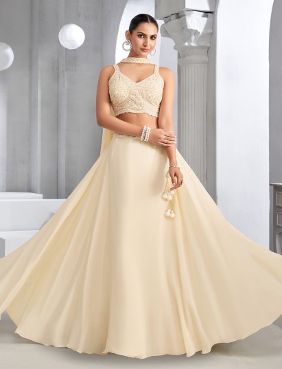 Beige reception wear crepe silk lehenga choli with choker dupatta