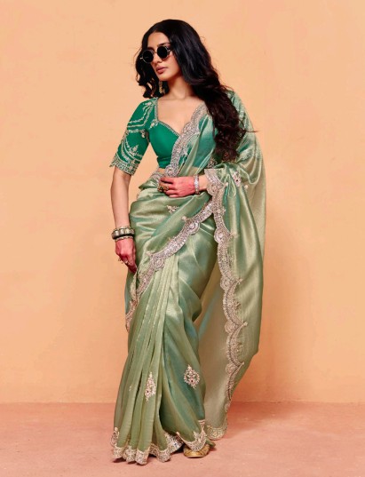 Pastel pista green tissue silk elegant festive saree