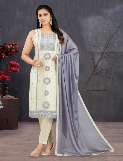 Cream dola silk zari and stone festive suit