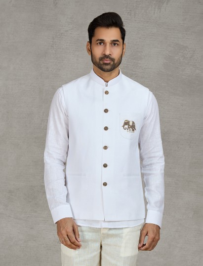 White linen waistcoat shirt set adorned with fine zardosi craftsmanship