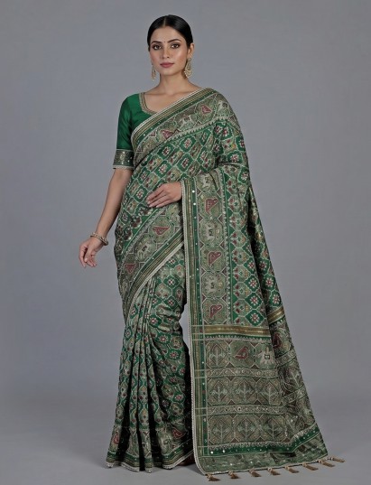 Green art patola silk saree with sequins and zardosi work