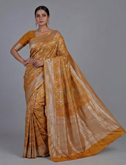 Mustard yellow banarasi silk saree with meenakari zari detailing