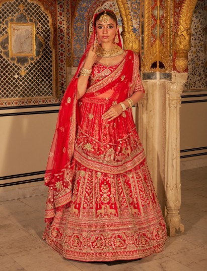Red silk net bridal lehenga choli with traditional work