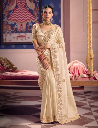 Cream viscose zari tissue saree with rich border work