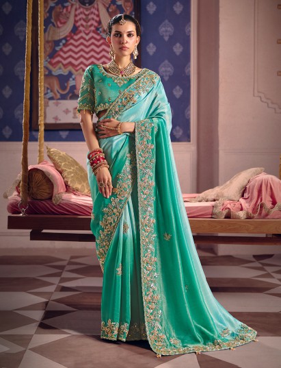 Aqua blue viscose zari tissue saree with shimmering border detailing