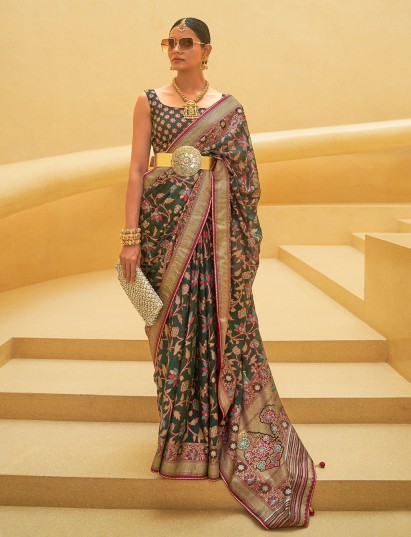 Dark green soft organza saree with refined zari glow