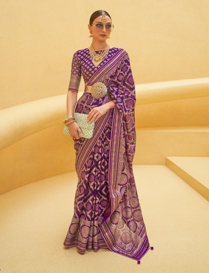 Purple soft organza saree with festive zari detailing