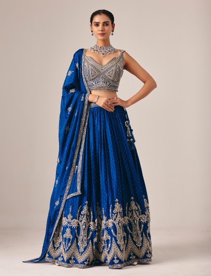 Royal blue silk lehenga choli with stone and mirror accents