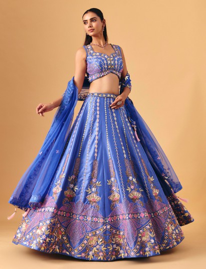 Royal blue silk lehenga choli with delicate pearl embellishments