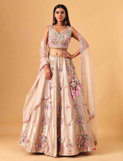 Beige silk lehenga choli with pearl and sequin accents