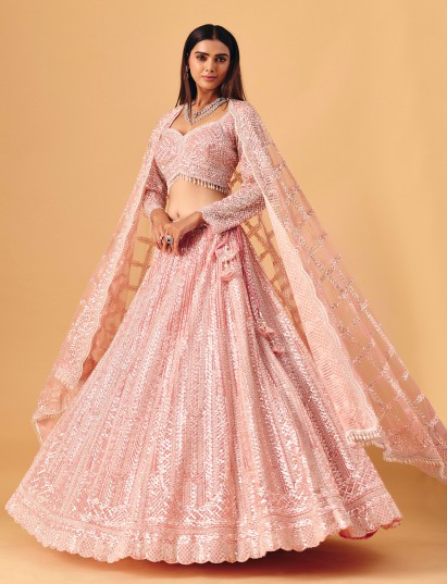 Light pink net lehenga choli with diamond shimmer accents