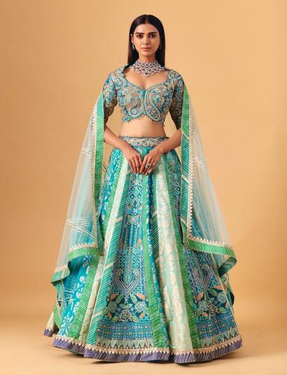 Blue silk lehenga choli with zardosi and gota work elegance